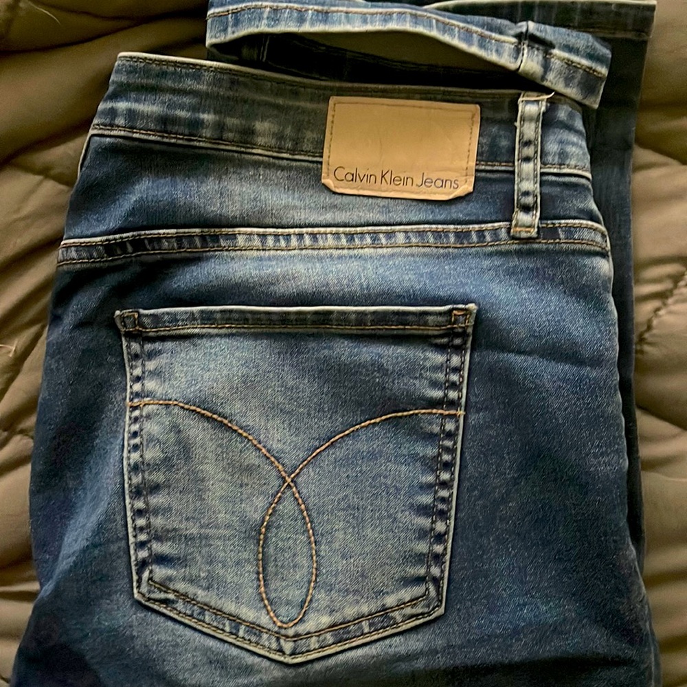 Calvin Klein blue jeans stretchy slim fit distressed